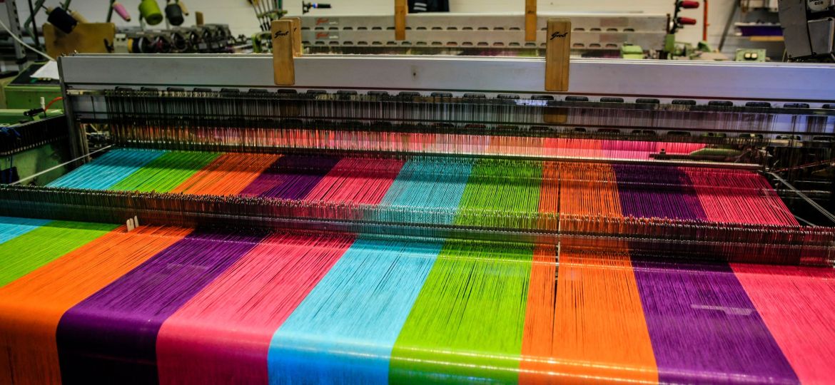 Modern weaving machine producing elaberate patterned textile for the World markets